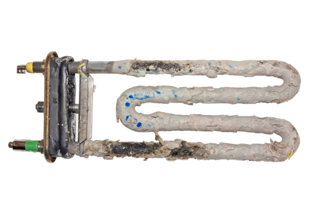Worn out water heater heating element with hard water sediment damage — water heater repair and replacement in Dayton Ohio