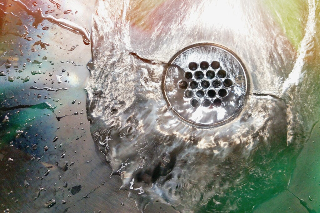 water in a slow drain